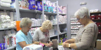 Members of 2 churches and K of C do a ‘Day of Caring and Sharing’