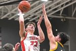 Tigers’ late stretch beats Starfires in ACAC boys’ opener