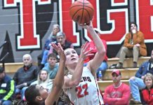 Ault leads Tigers onSenior Night over Squires, Dick records 25 points