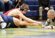 Tigers take over The Castle, secure a sweep in Wells County for wrestling