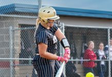 Knights get production from bottom of the order in NE8 softball opener