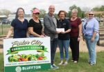 Bluffton community garden openswith ribbon cutting