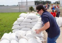 Volunteers fill sandbags as Wells County remains under flood watch