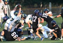 Lions hand the Knights their first loss in NE8 opener