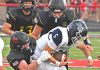 Fast start carries the Tigers past Warriors in ACAC play