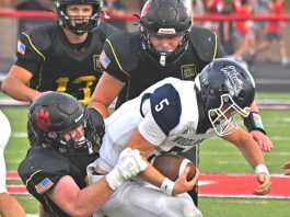 Fast start carries the Tigers past Warriors in ACAC play