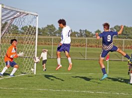 Patriots win physical boys’ soccer match with the Knights