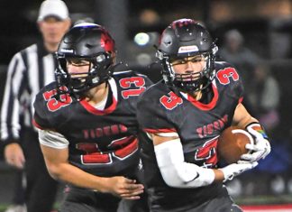 Tigers outlast Patriots, remain perfect after Week 7